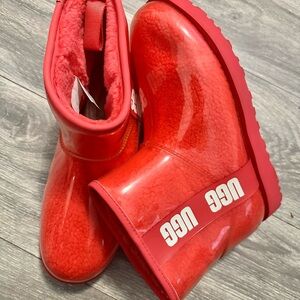 Ugg rain boots with fur inside I tried on in house. In new condition. Retai $250